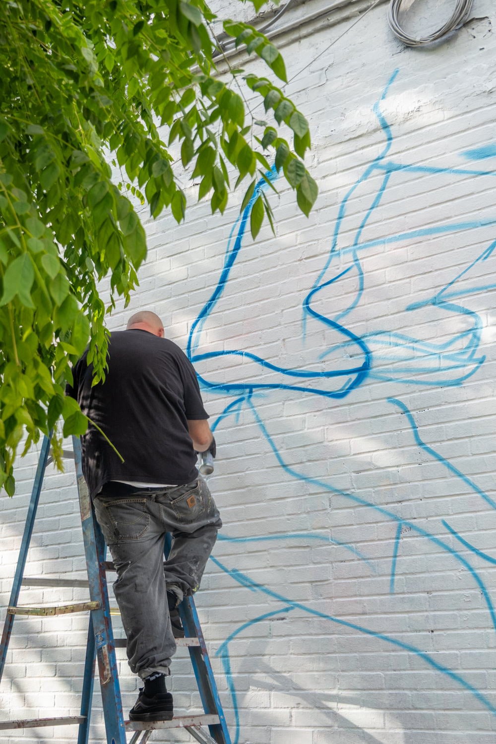 WORK IN PROGRESS STREET ART MURAL BY SOZYONE FOR EL MALO SOLO URBAN ART SHOW NEW YORK CLLCTV.NYC GALLERY