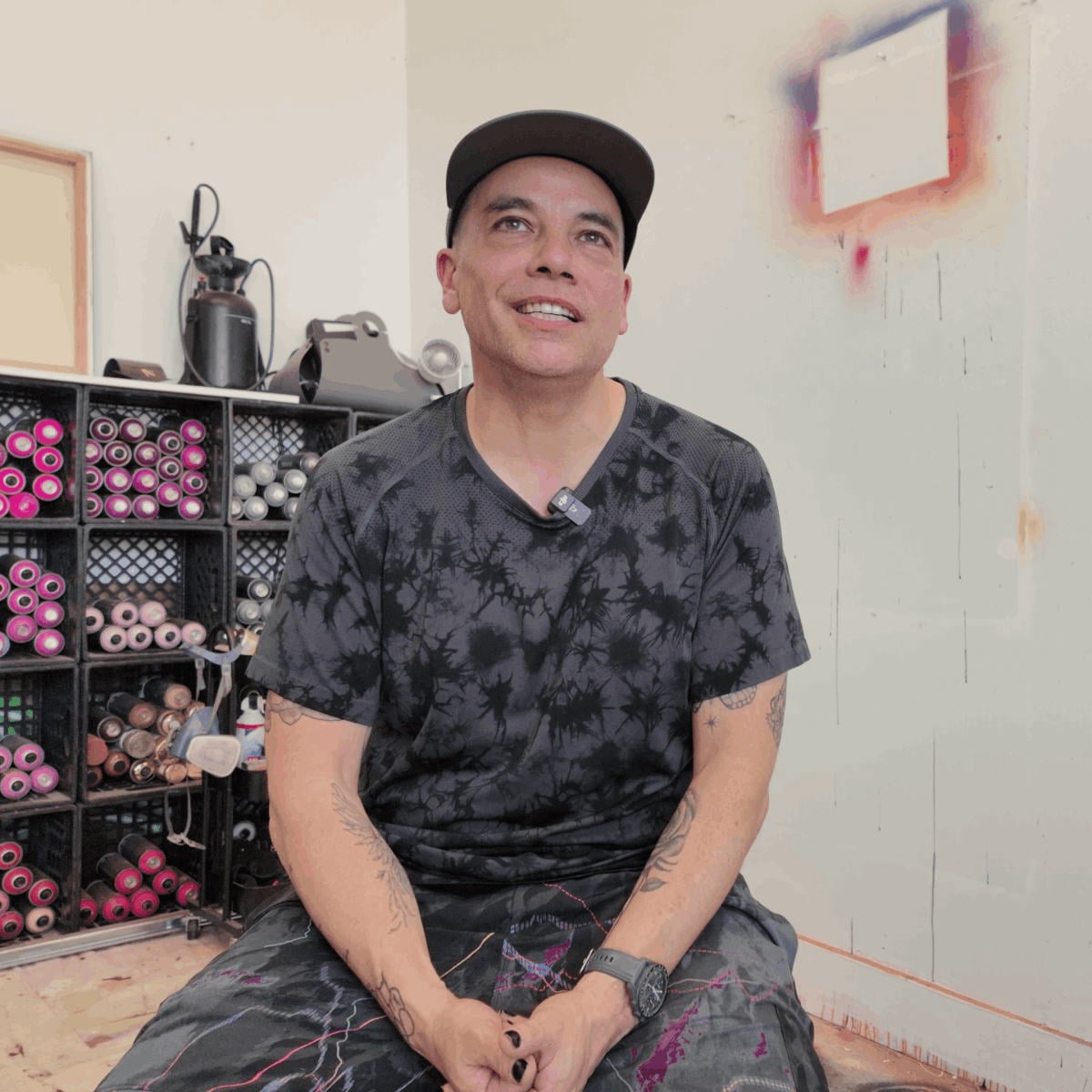 STREET ARTIST ADAM FUJITA IN HIS STUDIO BEFORE THE LOS COLORES URBAN ART SHOW IN LIEGE BELGIUM AT THE BURONZU GALLERY