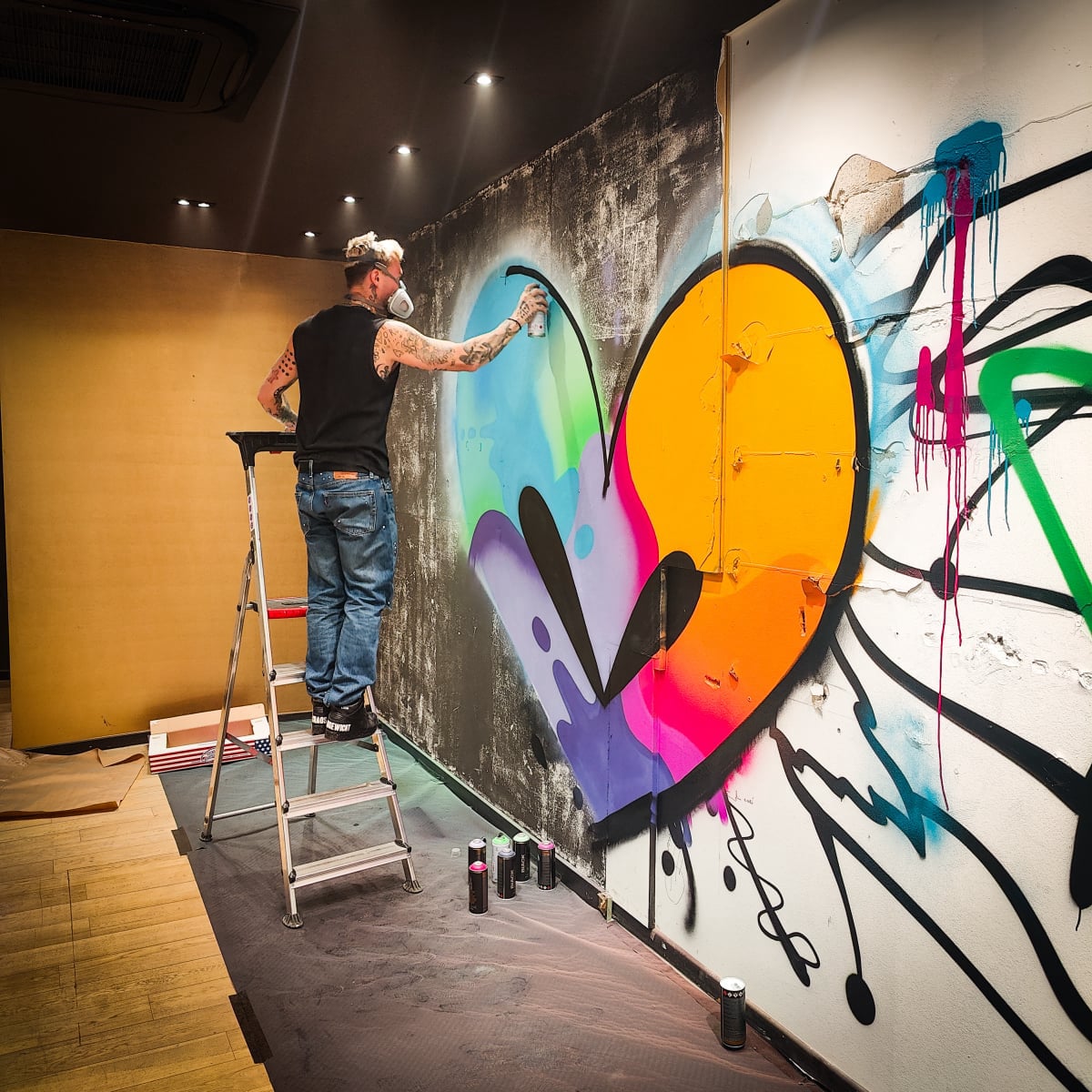 WORK IN PROGRESS STREET ART MURAL BY JASON NAYLOR AND ADAM FUJITA FOR LOS COLORES GROUP URBAN ART SHOW LIEGE BELGIUM AT THE BURONZU GALLERY